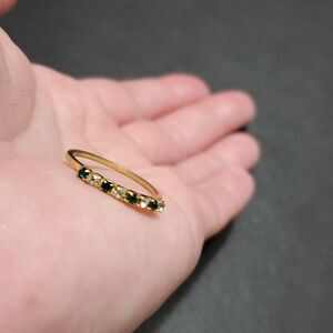 **Final Sale** Gold tone green and clear rhinestone ring size 6.75
